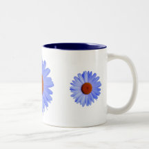 Becher des blauen Gänseblümchens Haferl