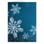 Blauer Weihnachtsschneeflockehintergrund Grußkarte