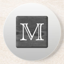 Druckmuster-und Gewohnheits-Buchstabe. Schwarzweis Bierdeckel