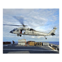 Ein MH-60S Seahawk bereitet vor sich, ammunitio zu Fotodruck