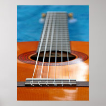 Eine Nahaufnahme einer Akustikgitarre Plakate