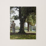 Foto einer Mannmalerei im Park Puzzle