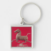 Galoppierendes Pferd mit einem Huf, der auf a stil Schlüsselband