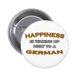 Glück wacht nahe bei einem Deutschen auf Buttons
