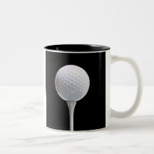 Golfball und T-Stück auf Schwarzem besonders angef Teehaferl