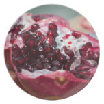 Granatapfelfruchtmakrofoto-Samenrot Flache Teller