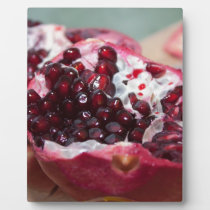 Granatapfelfruchtmakrofoto-Samenrot plaketten