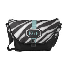 Monogrammzebra-Druck-Muster mit aquamarinem Band Kurier Taschen