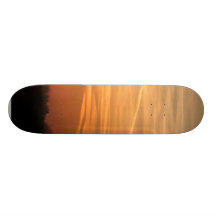 Netter orange Sonnenuntergang Skateboardbretter
