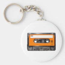 Orange Aufkleberachtziger jahre Kassette Schlüsselanhänger