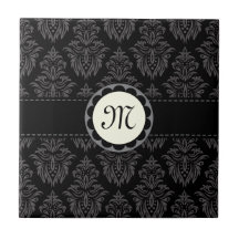 Schwarze und graue Damastfliese des Monogramms/Ges