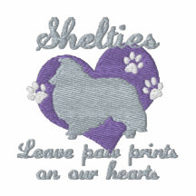 Shelties verlassen Tatzen-Drucke