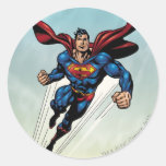 Supermann springt aufwärts runde aufkleber