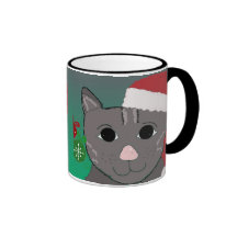 Weihnachtskatze in einer roten Weihnachtsmannmütze Kaffeetasse