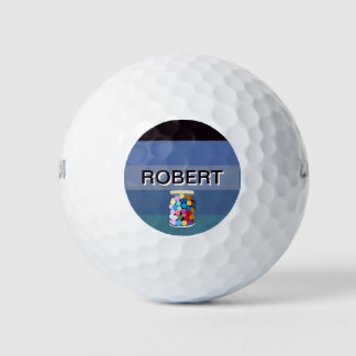 С leckere Bonbons in einem Glas Golfball