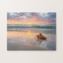 Suche nach tritonshorn puzzle Strand