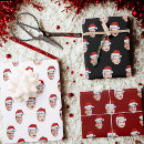 Suche nach leiter geschenkpapier Foto mit weihnachtsmannmütze