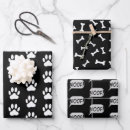 Suche nach hund und knochen geschenkpapier Pfotendrucke