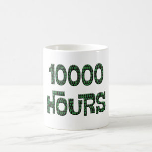 10000 Stunden mit einer Überlagerung von Computer- Kaffeetasse