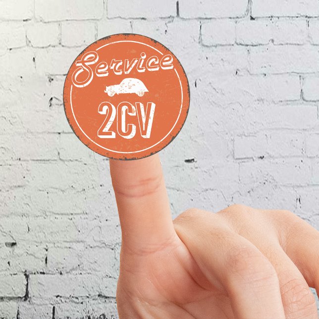 2CV Service Vintage Runder Aufkleber (2CV Round Sticker in Orange with a White Vintage Text and Deux Chevaux Illustration)