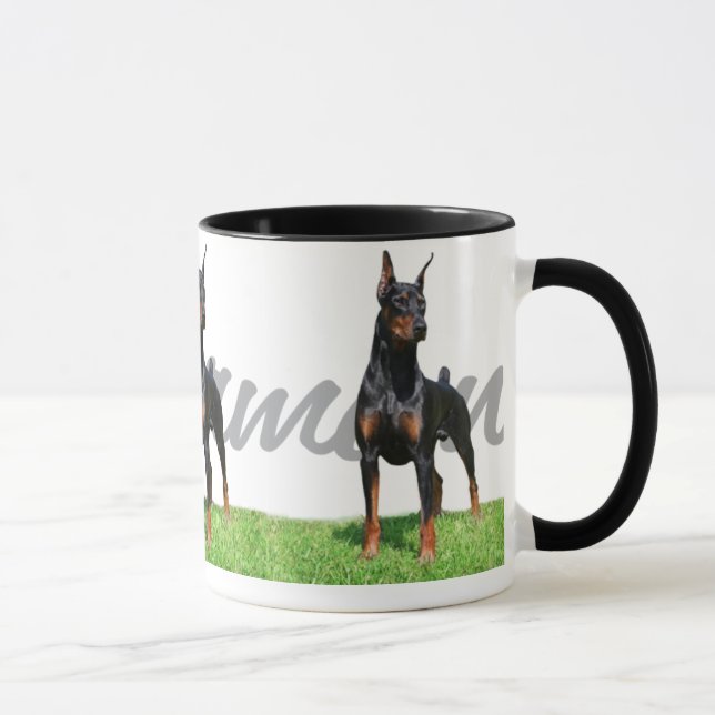3 schwarze DobermannPinschers mit Tasse (Rechts)