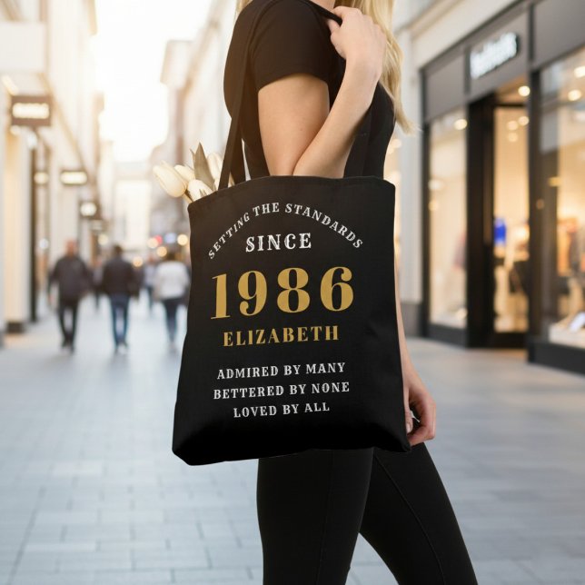 40th Birthday 1986 Black Gold For Her Personalized (Born 1986 birthday tote bag. Background out of focus.)
