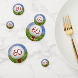 60. Geburtstagsgolfball auf rotem Tee Konfetti