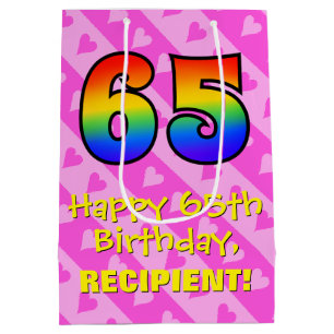65. Geburtstag: Fun-Rosa-Hörstreifen; Regenbogen  Mittlere Geschenktüte