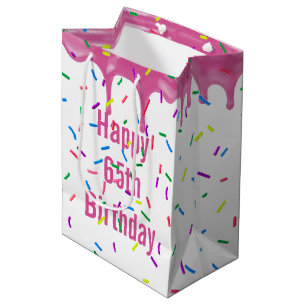 65. Geburtstagssprinkles auf rosa Icing Mittlere Geschenktüte
