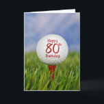 80. Geburtstags-Golfball Karte<br><div class="desc">Nah oben von einem weißen Golfball auf einem roten T-Stück im Gras mit Himmelhintergrund für 80. Geburtstag.</div>