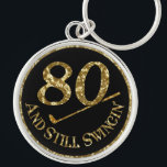 80 und immer noch Swingin'Golf Balls Schlüsselanhänger<br><div class="desc">Schlüsselanhänger zum 80. Geburtstag für Golfer.</div>