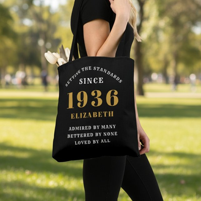 90th Birthday 1936 Black Gold For Her Personalized (Born 1936 birthday tote bag. Background out of focus.)