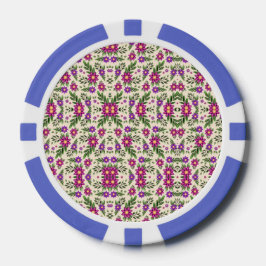 A casino chip features intricate floral patterns