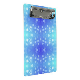 A clipboard featuring a blue and teal bokeh patter mini klemmbrett