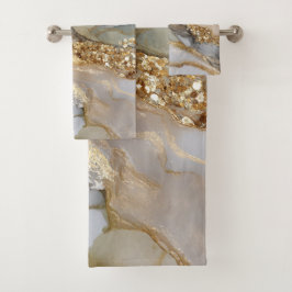 A luxurious gold and white marble background badhandtuch set