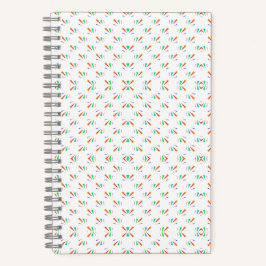 A notebook with a spiral binding features a white notizbuch