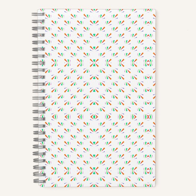 A notebook with a spiral binding features a white  notizbuch (Vorderseite)
