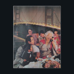 A Scenic Dinner at the Bridge at Night Postcard Postkarte<br><div class="desc">A collage made and photographed by Angelandspot in the year 2026 with vintage images from a magazine of a family eating dinner and a bridge at night</div>