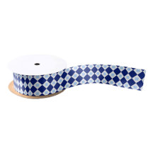 A spool of ribbon with a blue & white diamond 