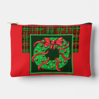 A wreath with a big red bow on plaid zubehörtasche