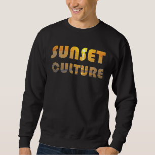 Abendstimmung am Strand die Sonne sinkt ins Meer a Sweatshirt
