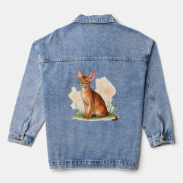 Abessinische Katze umgeben von sanften Farben und  Jeansjacke