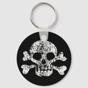 Abgenutzter Totenkopf und Kreuzknochen Schlüsselanhänger