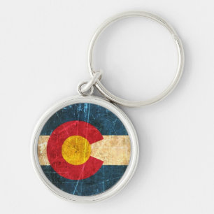 Abgeriebene und getragene Colorado-Flagge Schlüsselanhänger