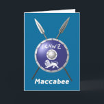 Abschirmung und Speere Feiertagskarte<br><div class="desc">Eine Darstellung eines Maccabee's Schildes und zwei Speere. Der Schild wird von einem Löwen und Text mit dem Text "Israel" (Israel) im Paleo-Hebräischen Alphabet geschmückt. Es erscheint auch der englische Text "Maccabee". Fügen Sie Ihren eigenen Text hinzu. Die Maccabees waren jüdische Rebellen, die Juden aus dem Joch des Seleukiden Reiches...</div>