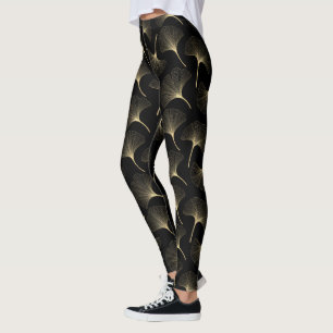 Abstrakte Blätter aus Schwarz und Leichtgold Leggings