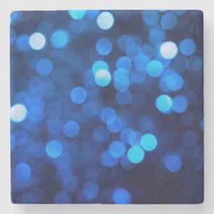 Abstrakte blaue Lichtpunkte Steinuntersetzer