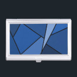 Abstrakte Blaue Polygonen Visitenkarten Dose<br><div class="desc">Inspiriert durch Buntglas, enthält dieses stilvolle geometrische Design Polygone in verschiedenen Blautönen, die in schwarz umrissen sind. Ein hellblaues Dreieck schleicht sich von oben rechts ein, mit einer Reihe von zunehmend dunkleren blauen Quadrangles und anderen Formen, die sich von Licht zu Dunkel bewegen. Zwei dunkelblaue Formen bilden die links Seite...</div>