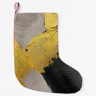 Abstrakte einfarbige Farben mit goldenen Pinselstr Kleiner Weihnachtsstrumpf