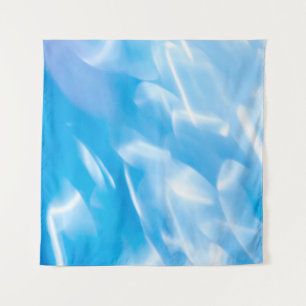 Abstrakte Glitterlichter auf blauem Hintergrund. R Wandteppich